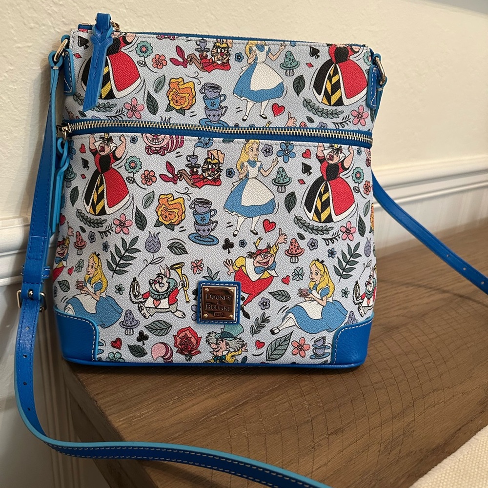 Dooney & Bourke Alice in Wonderland satchel.